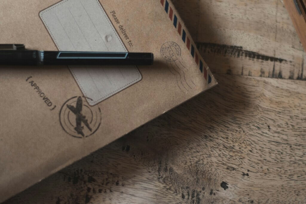 Envelope with pen
